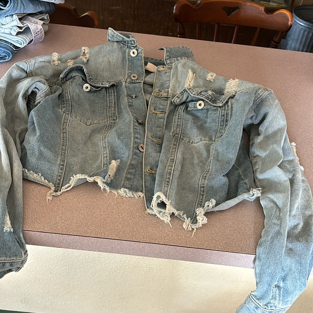 Cropped ripped jeans jacket